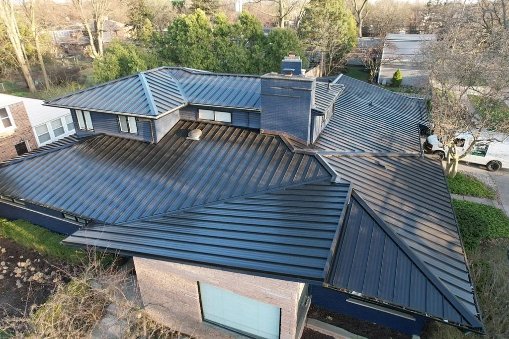 black standing seam metal roof freshly installed