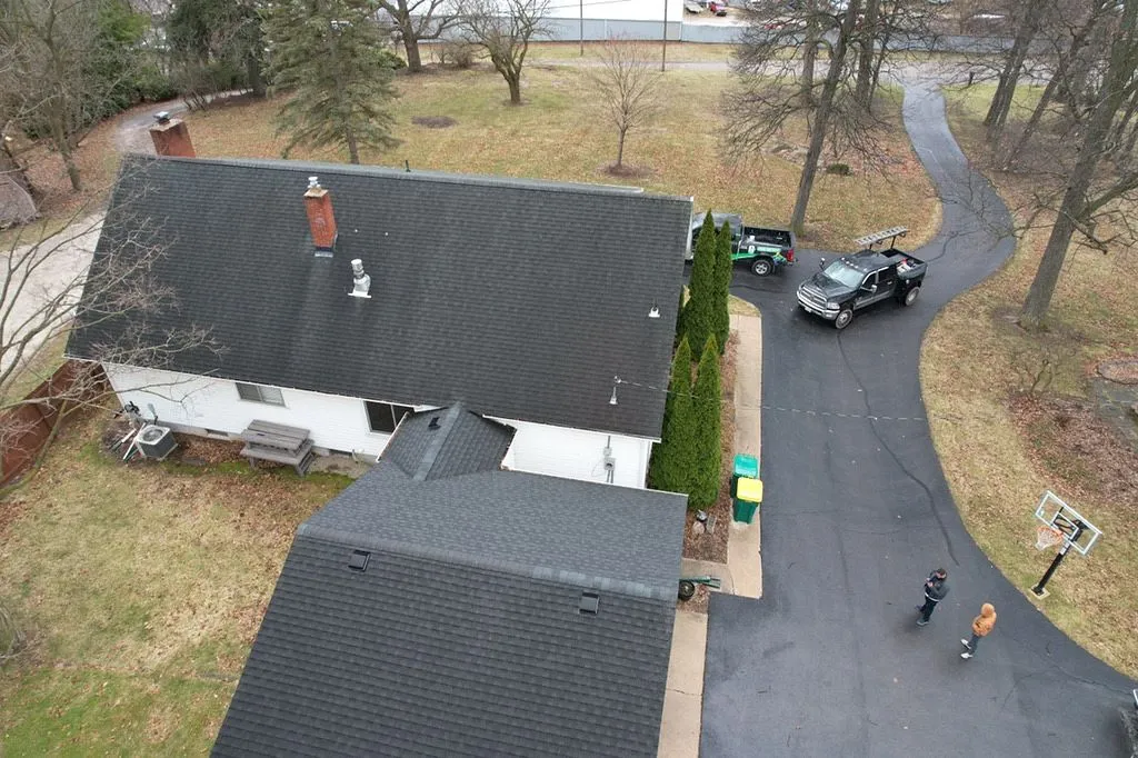 overhead view of older shingle roof in need of replacement
