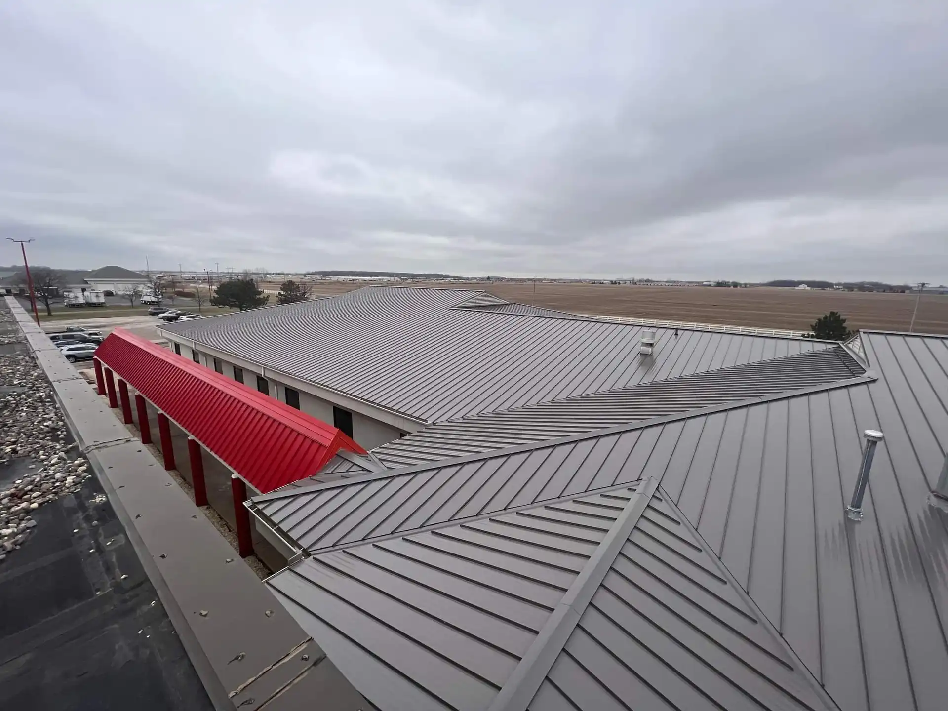 commercial roof red black grey flat rooftop