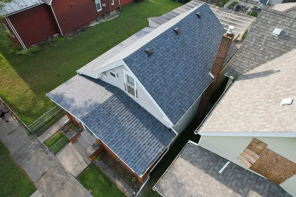 Beautiful recently replaced blue shingle roof