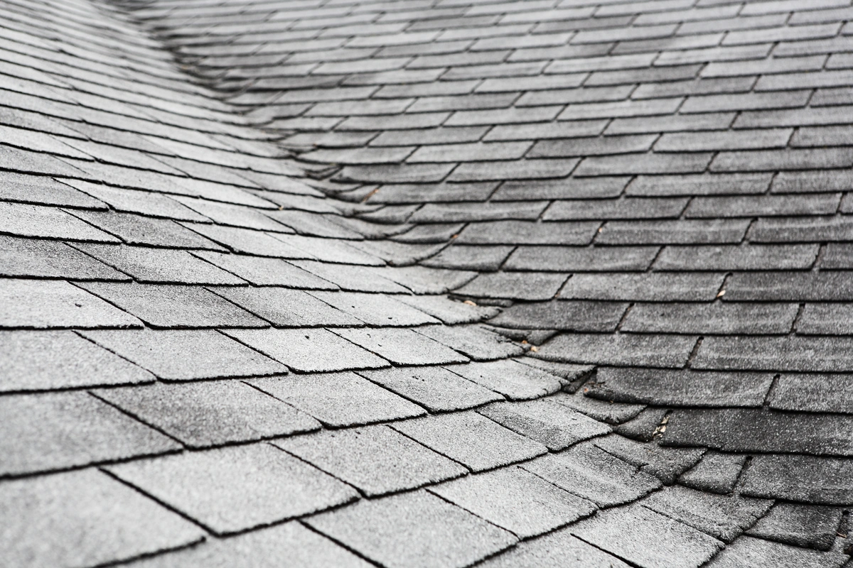 dry and cracked shingles on top of a roof