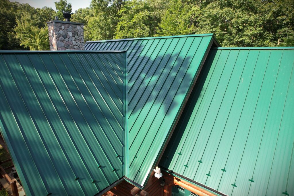 Gorgeous green metal roofing replacement done by Shingle and Metal Roofs, LLC.