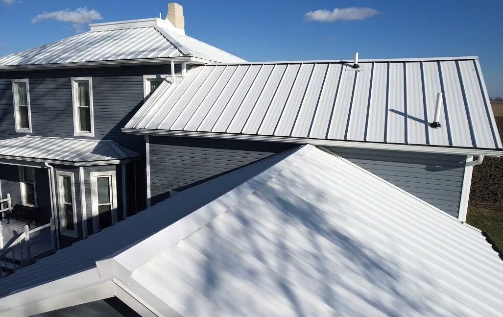 Beautiful metal roofing replacement done in Polar White by Shingle and Metal Roofs, LLC.