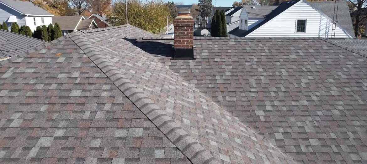 Colonial Slate asphalt shingles provided by Owens Corning and installed by Shingle and Metal Roofs